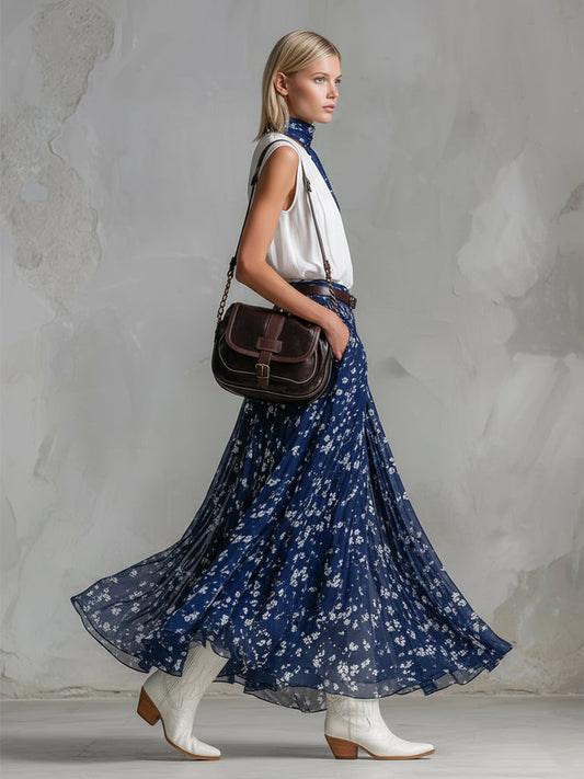 Elegant White Sleeveless Top and Blue Floral Chiffon Skirt Set