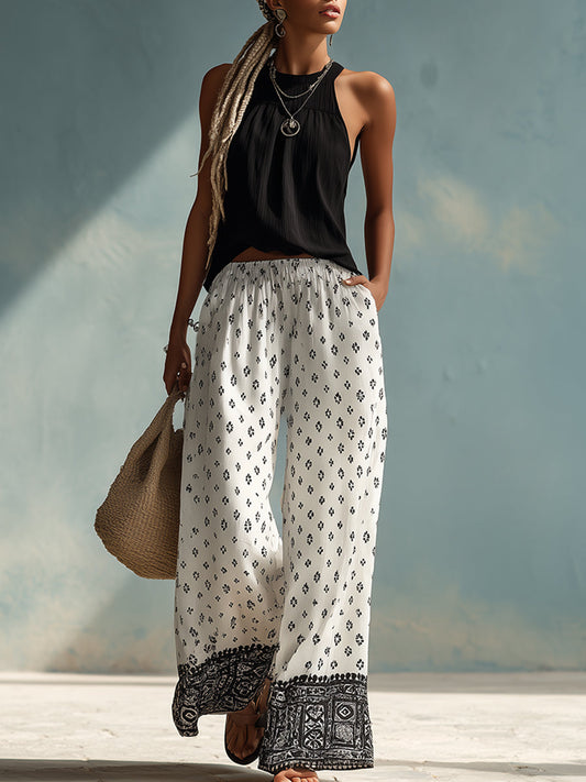 Chic Black Halter Top With Printed Chiffon Wide-Leg Pants Set